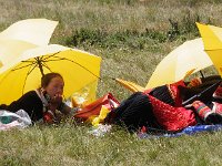 L'ombrelle assure un teint pâle malgré le soleil
